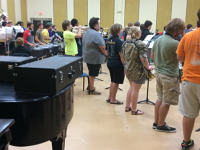 Students in Session  Prior to the showing of the film, students in the music program were in session at the Music Hall