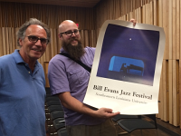 Bruce with Assistant  Bruce and his assistant take note of the Bill Evans Jazz Festival held in Hammond, Louisiana